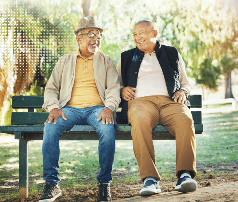 Two people sitting together on a bench